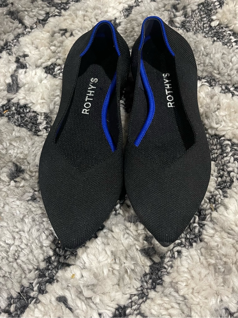 Rothy's Black Pointed Flats with Blue Trim